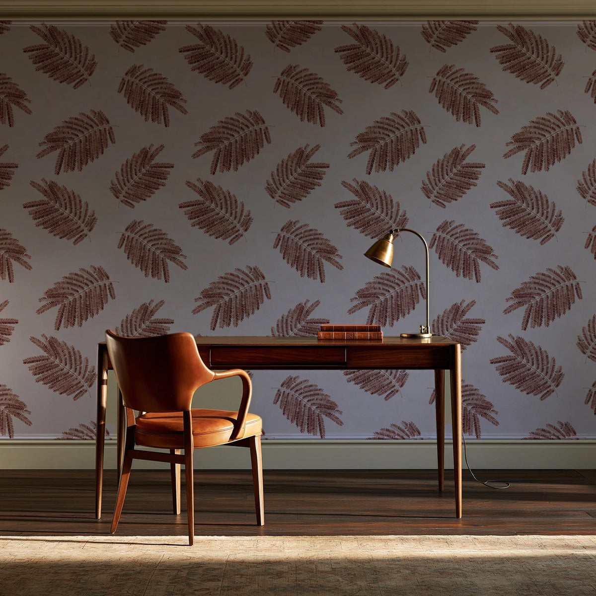 Acacia Scatter Oxblood dainty leaf wallpaper as a feature wall in a home study