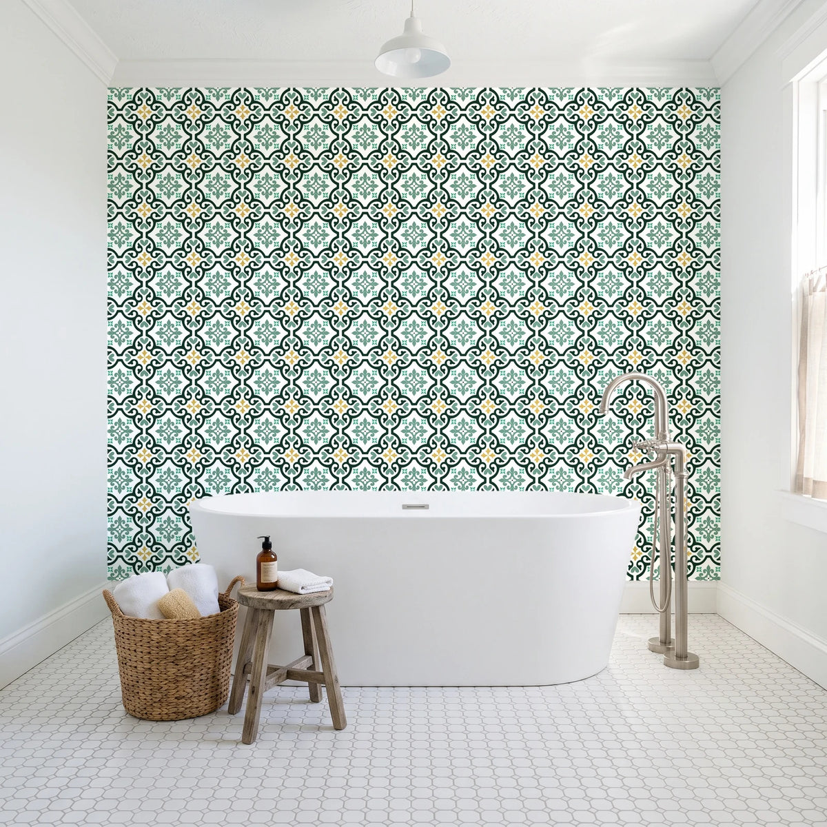 Andalusian Court Emerald encaustic tile wallpaper behind a freestanding tub in a bright coastal bathroom