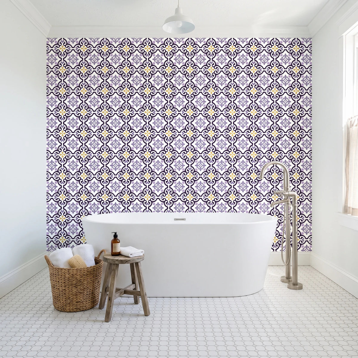 Andalusian Court Plum encaustic tile wallpaper behind a freestanding tub in a bright coastal bathroom