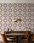 Andalusian Court Terracotta encaustic tile wallpaper behind a walnut credenza and round table in an elegant dining room