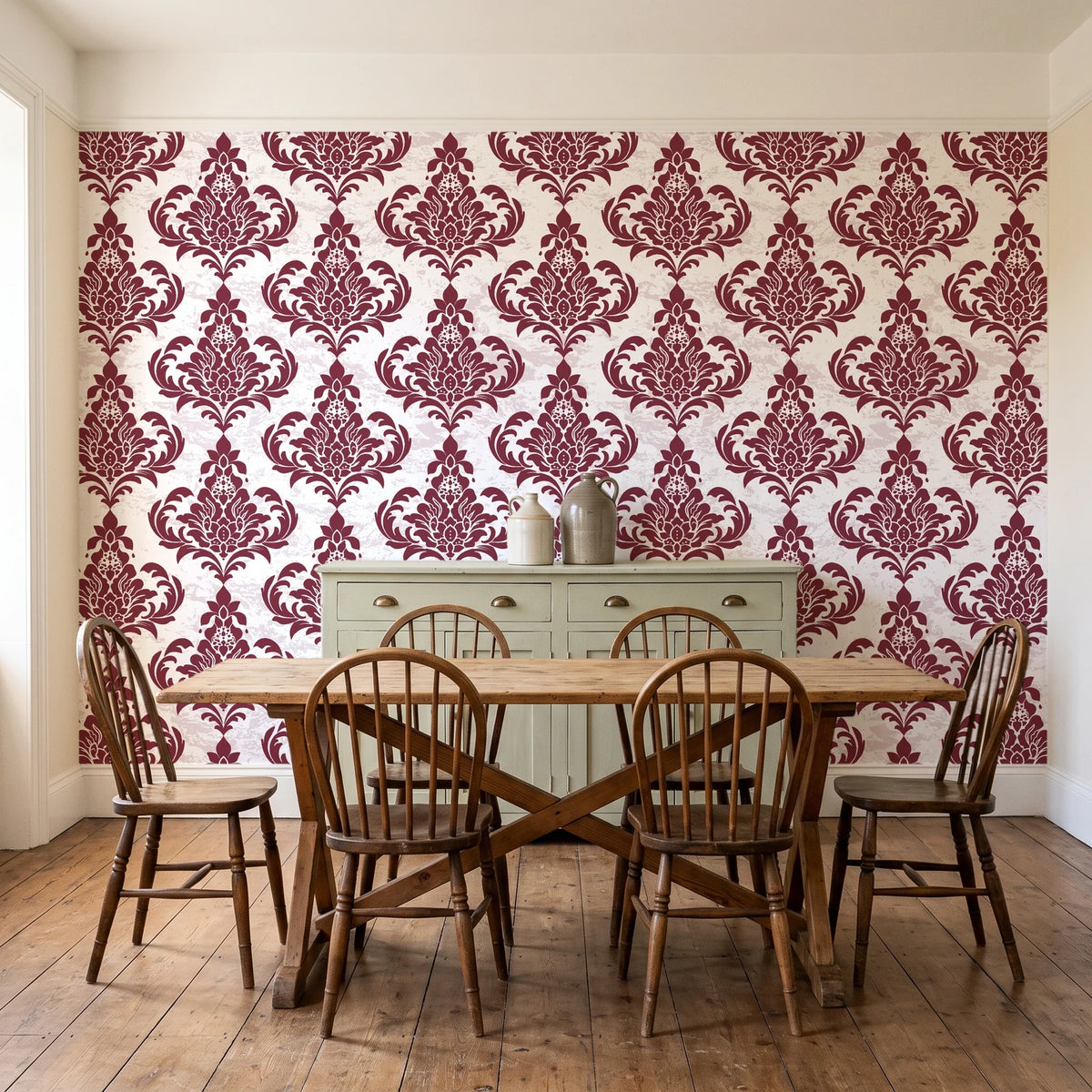 Antique Fern Mist Garnet distressed damask wallpaper in a farmhouse dining room with a sage sideboard and rustic trestle table