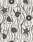 Apricot Tides Charcoal coastal seashell wallpaper in charcoal and oat