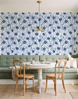 Apricot Tides Navy coastal seashell wallpaper as a feature wall in a sunlit breakfast nook