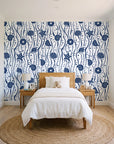 Apricot Tides Navy coastal seashell wallpaper in a bright, cheerful child's bedroom