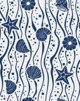 Apricot Tides Navy coastal seashell wallpaper in navy and pearl