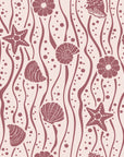 Apricot Tides Rosewood coastal seashell wallpaper in rosewood and blush