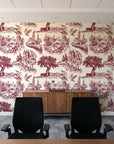 Arcadian Reverie Claret pastoral toile wallpaper above a walnut credenza in a modern conference room