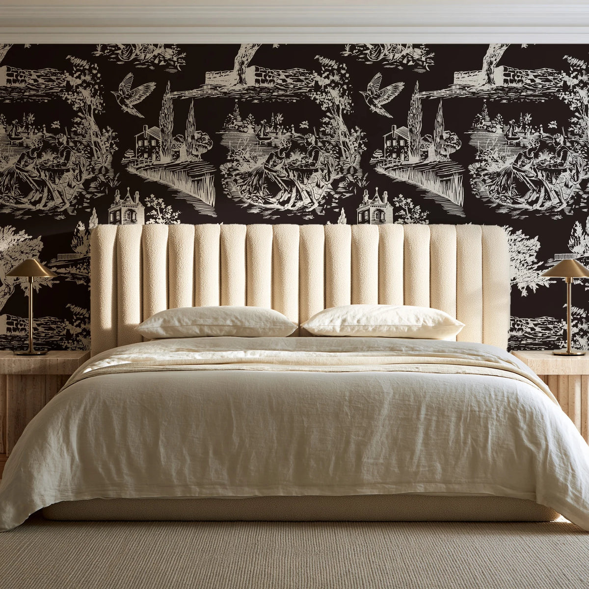 Arcadian Reverie Espresso pastoral toile wallpaper behind a channel-tufted bed in a calm primary bedroom