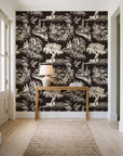 Arcadian Reverie Espresso pastoral toile wallpaper behind a console table in a light entry hallway