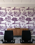 Arcadian Reverie Plum pastoral toile wallpaper above a walnut credenza in a modern conference room