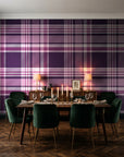Autumn Lattice Plum plaid wallpaper in a dark moody dining room with a candlelit table