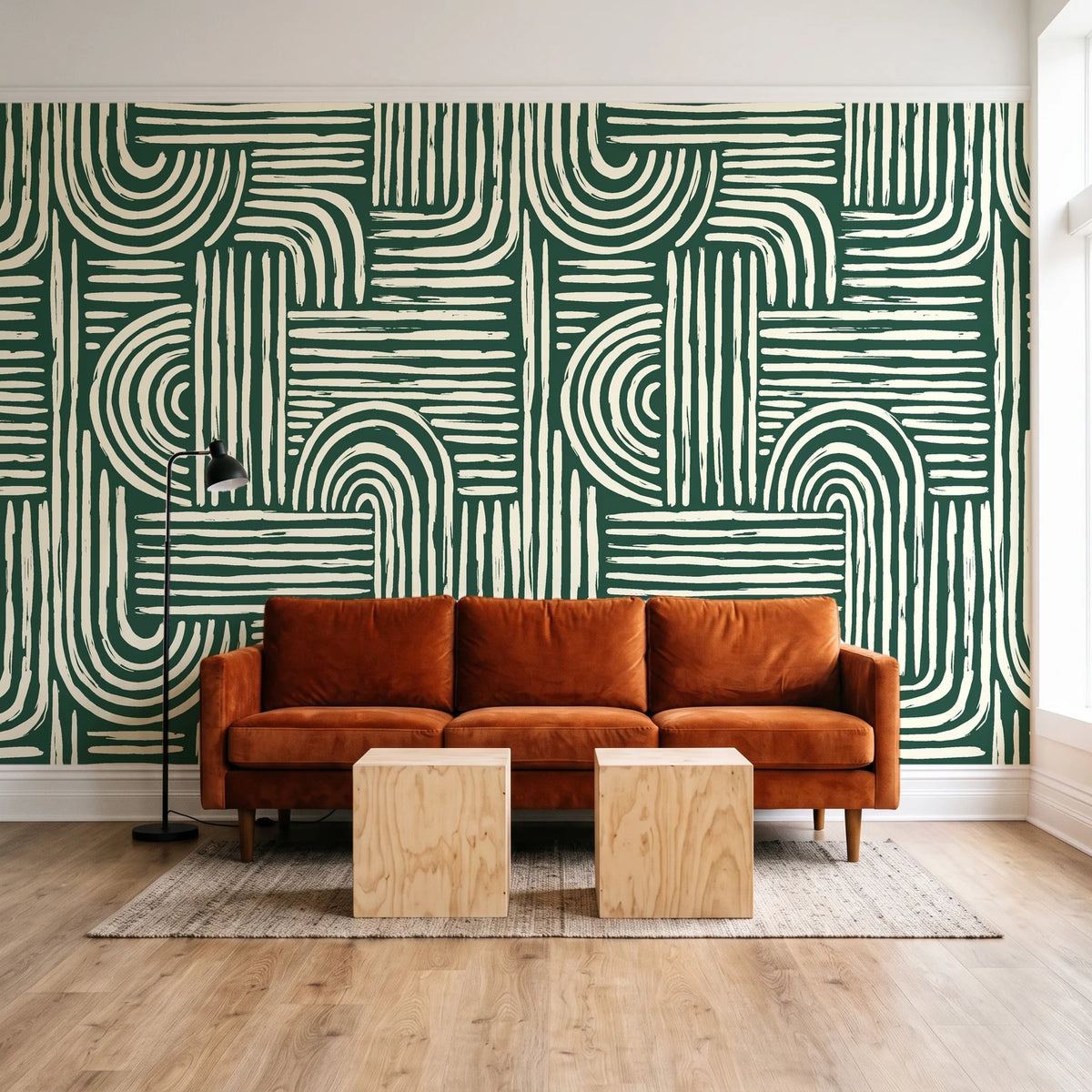 Bantu Lines Emerald brush geometric wallpaper behind a rust velvet sofa in a bright coworking lounge