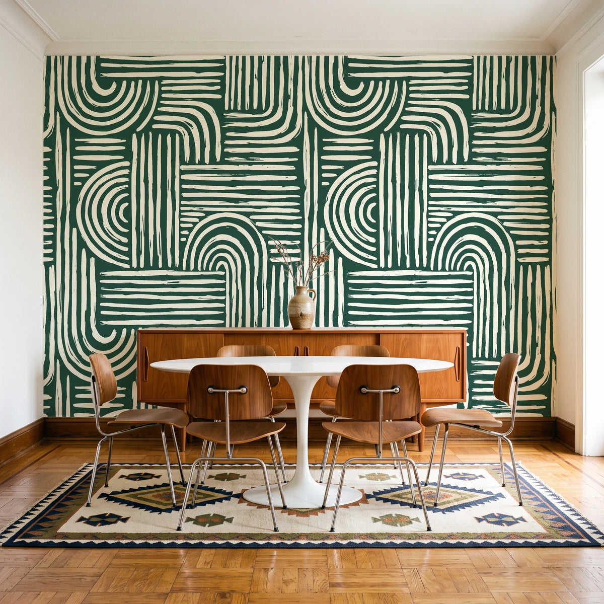 Bantu Lines Emerald brush geometric wallpaper in a mid-century dining room with a teak sideboard and tulip table