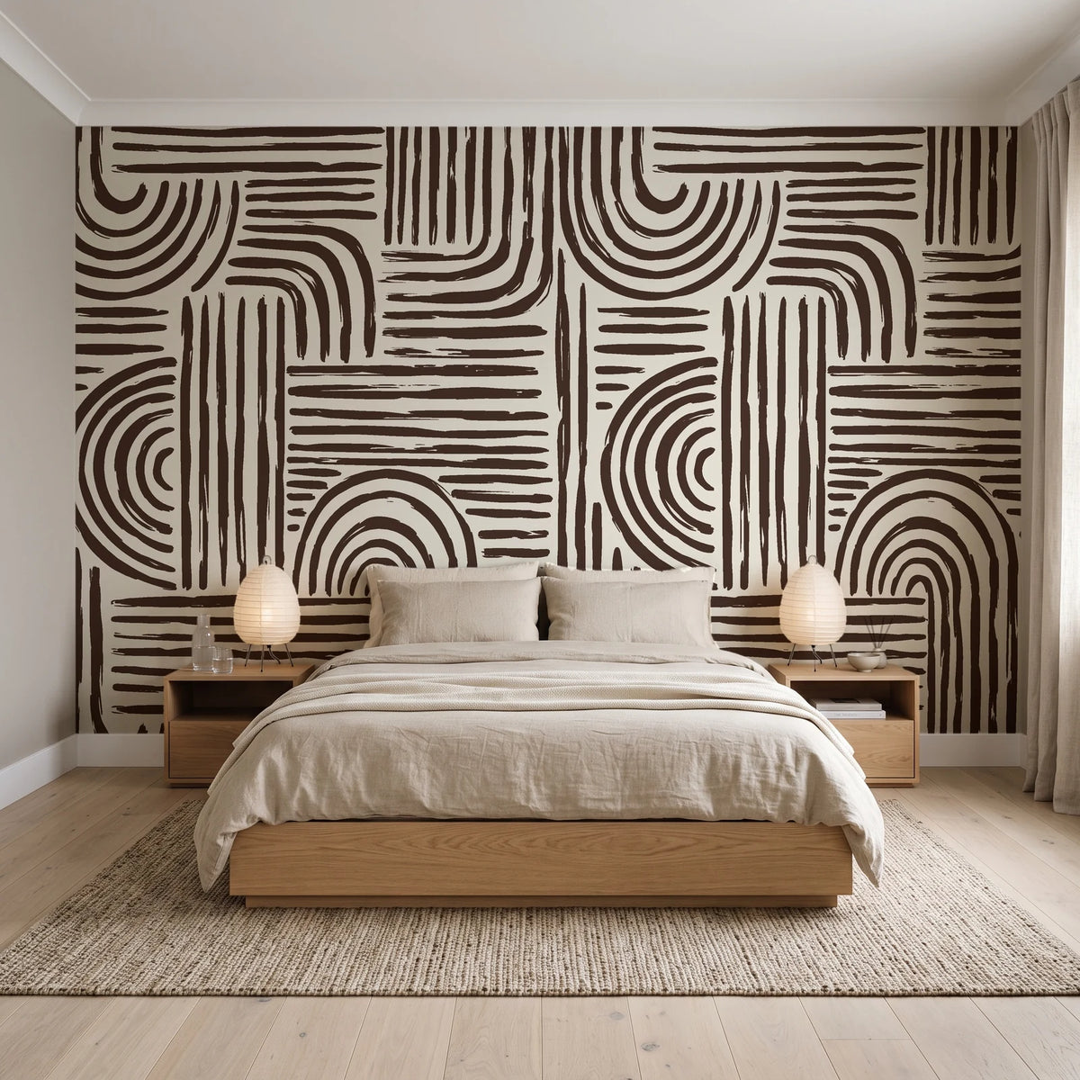 Bantu Lines Espresso brush geometric wallpaper behind a low platform bed in a serene Japandi bedroom