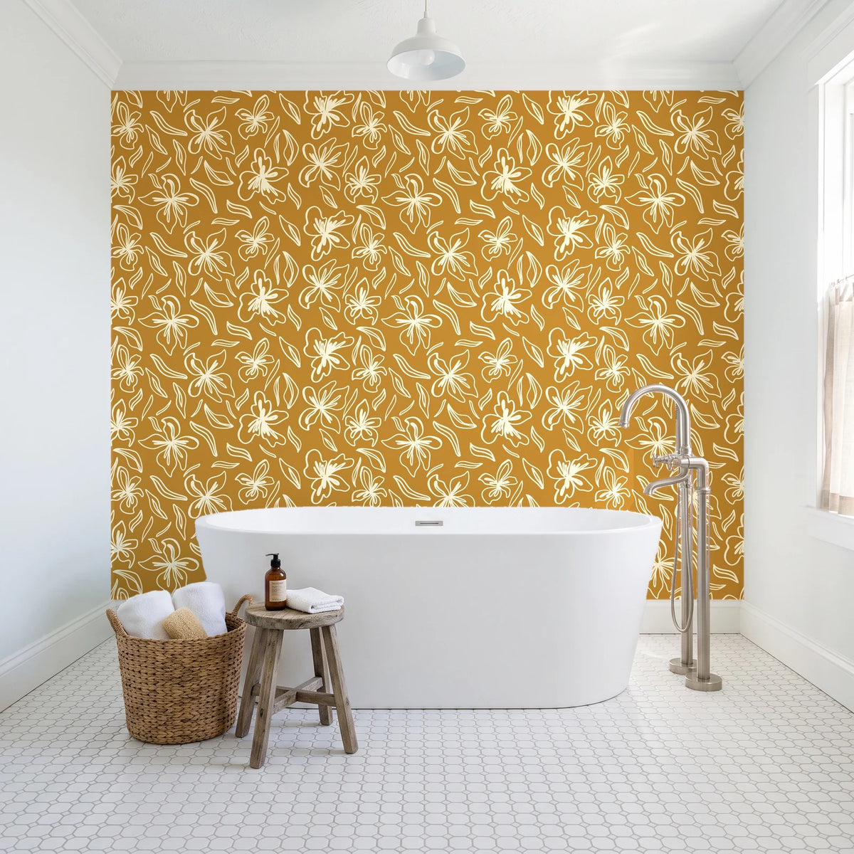 Blueprint Bloom Ochre floral line wallpaper behind a freestanding tub in a bright coastal bathroom