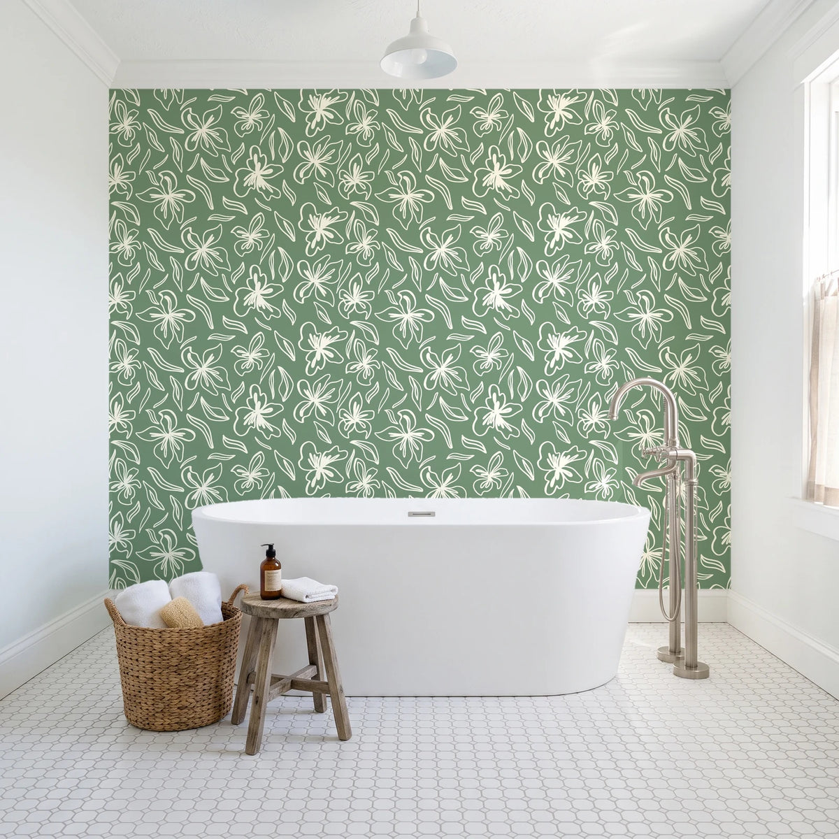 Blueprint Bloom Sage floral line wallpaper behind a freestanding tub in a bright coastal bathroom