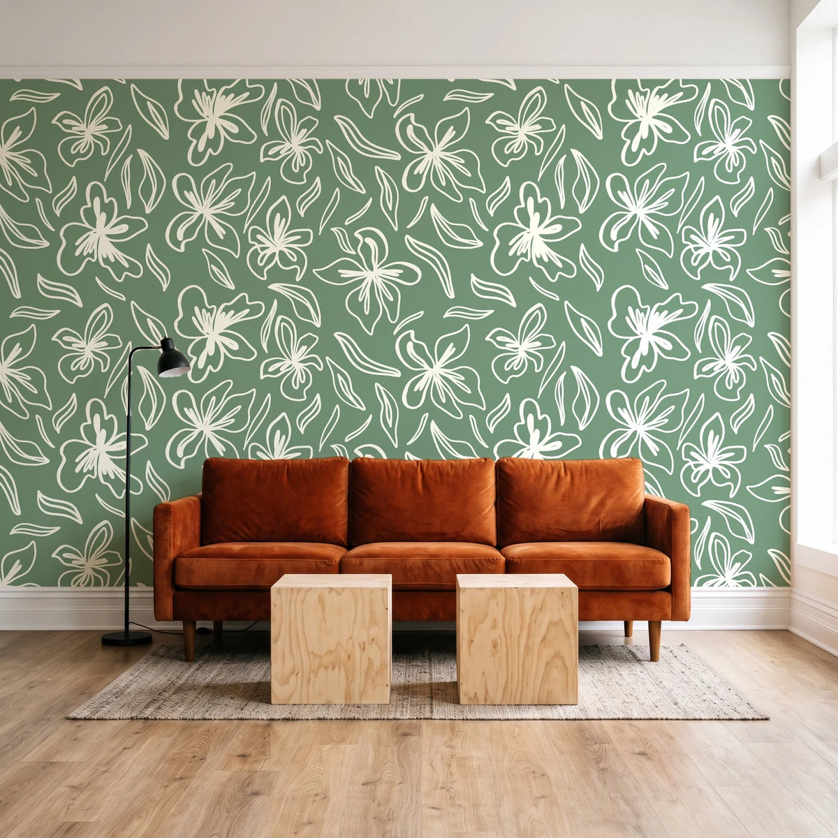 Blueprint Bloom Sage floral line wallpaper behind a rust velvet sofa in a bright coworking lounge