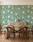 Blueprint Bloom Sage floral line wallpaper in a farmhouse dining room with a sage sideboard and rustic trestle table