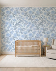Blush Serenade Delft floral damask wallpaper in a calm, light-filled nursery