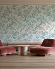 Blush Serenade Garden floral damask wallpaper in a boutique hotel sitting area