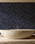 Blush Serenade Midnight floral damask wallpaper creating ambiance in a serene spa bathroom