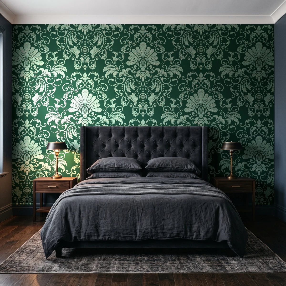 Blushed Whisper Emerald distressed damask wallpaper behind a tufted headboard in a dark, moody bedroom