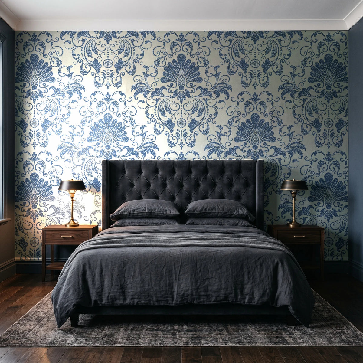 Blushed Whisper Linen distressed damask wallpaper behind a tufted headboard in a dark, moody bedroom