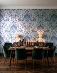 Blushed Whisper Linen distressed damask wallpaper in a dark moody dining room with a candlelit table