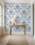 Blushed Whisper Linen distressed damask wallpaper behind a console table in a light entry hallway