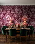 Blushed Whisper Oxblood distressed damask wallpaper in a dark moody dining room with a candlelit table