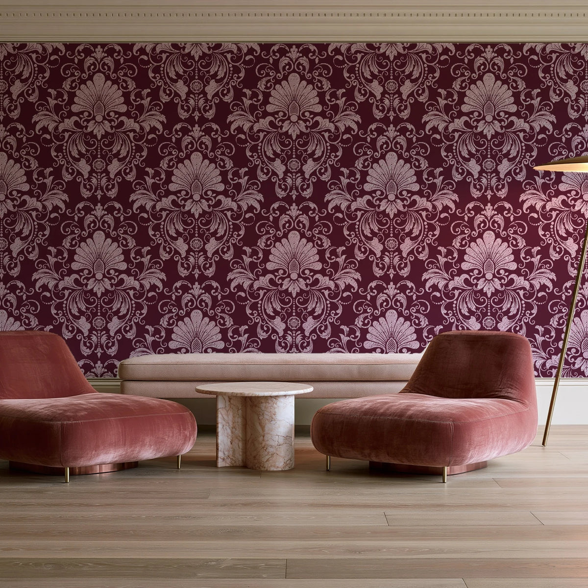 Blushed Whisper Oxblood distressed damask wallpaper in a boutique hotel sitting area