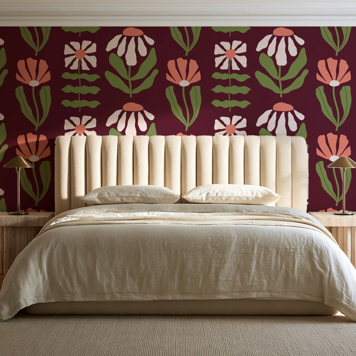 Bohemian Daisy Oxblood retro floral wallpaper behind a channel-tufted bed in a calm primary bedroom