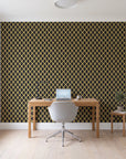 Butter Ogee Noir ogee trellis wallpaper behind a modern oak desk in a bright home office