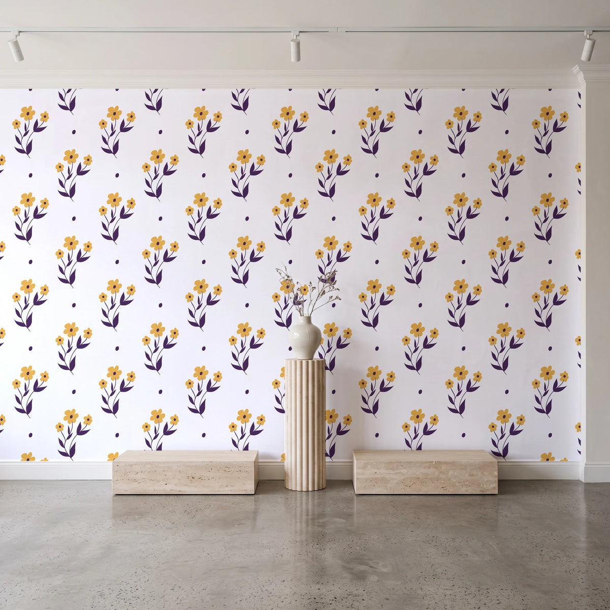 Buttercup Meadow Plum floral sprig wallpaper behind a travertine pedestal and vase in a minimal boutique