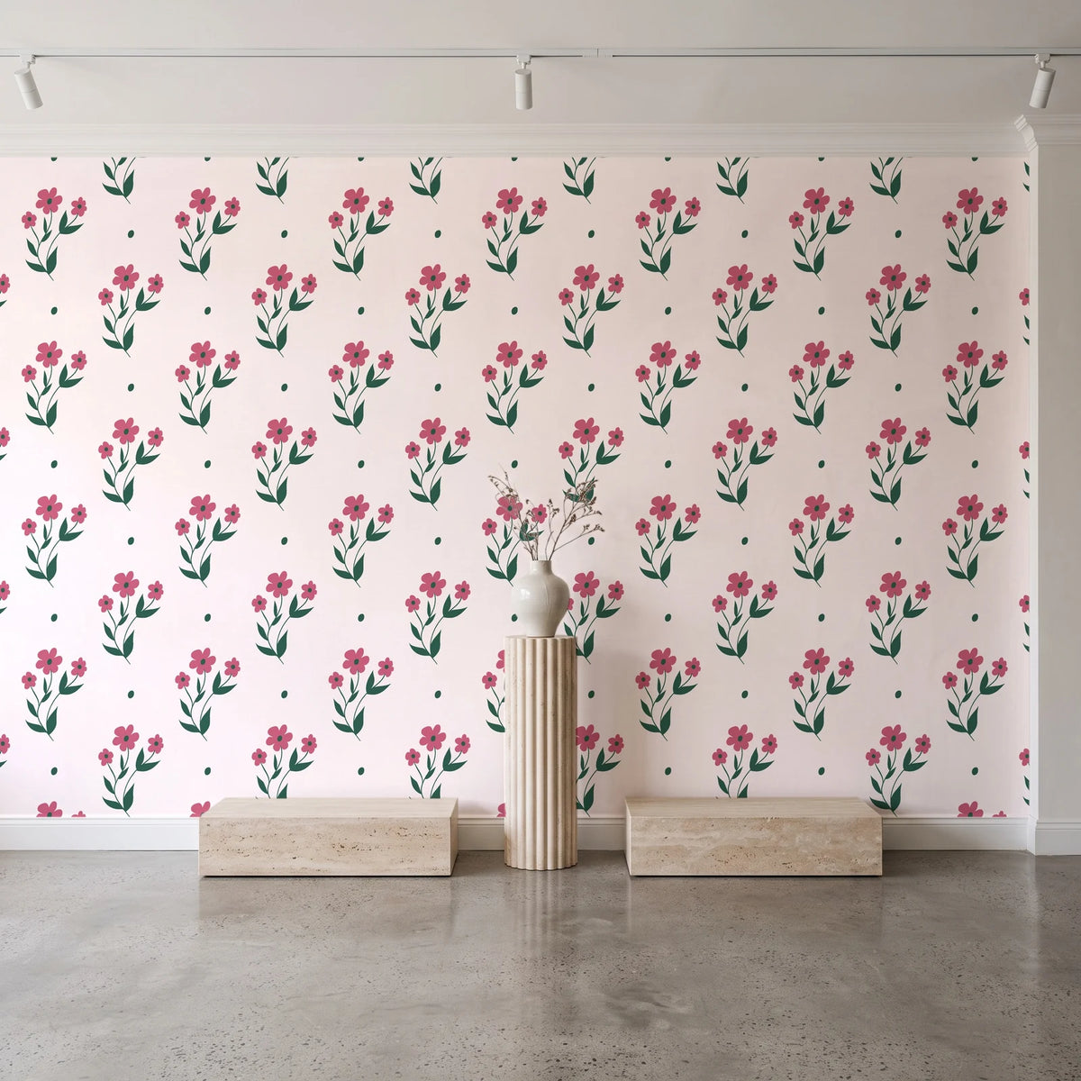 Buttercup Meadow Rose floral sprig wallpaper behind a travertine pedestal and vase in a minimal boutique