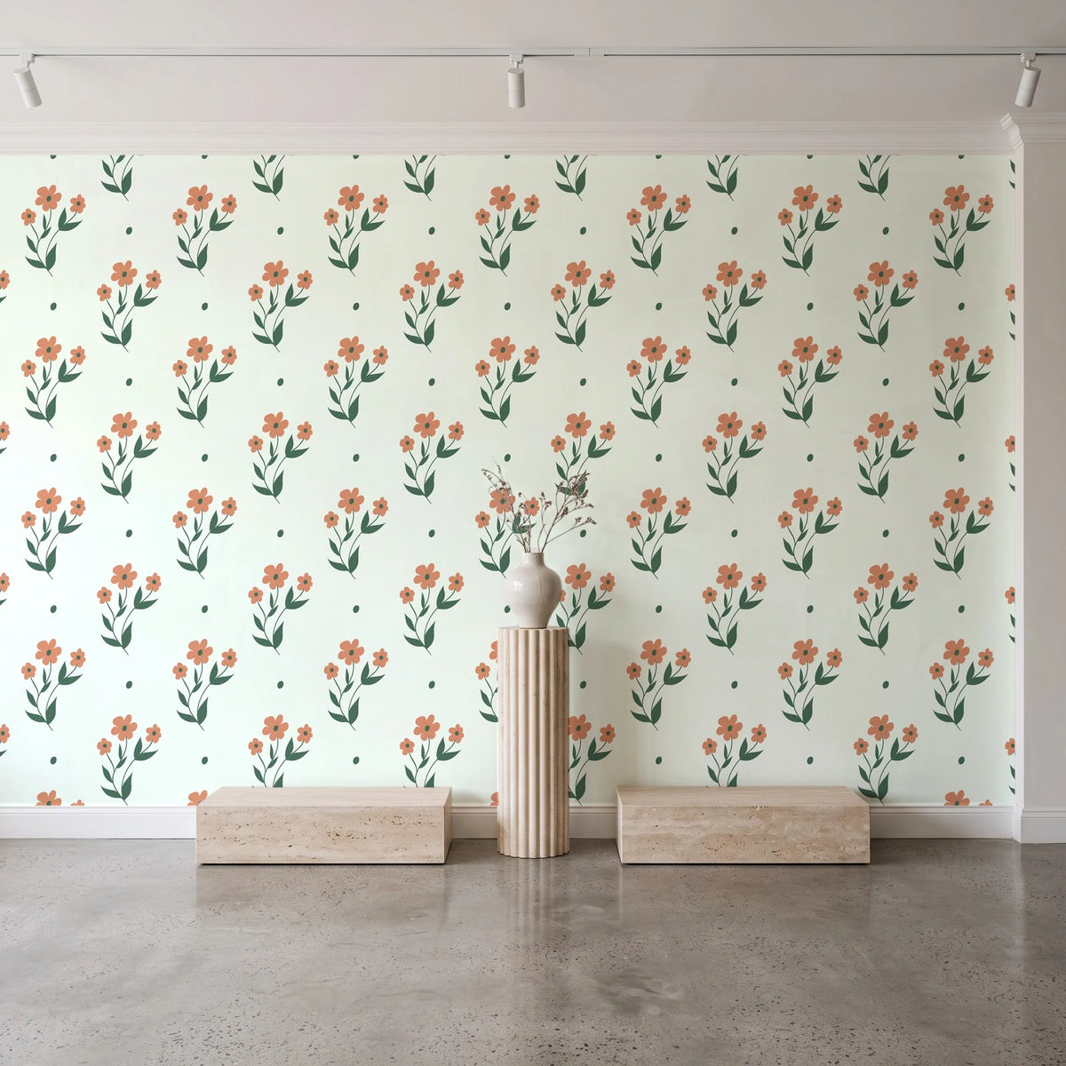 Buttercup Meadow Sage floral sprig wallpaper behind a travertine pedestal and vase in a minimal boutique