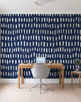 Canvas Dash Midnight minimalist dashes wallpaper behind a modern oak desk in a bright home office