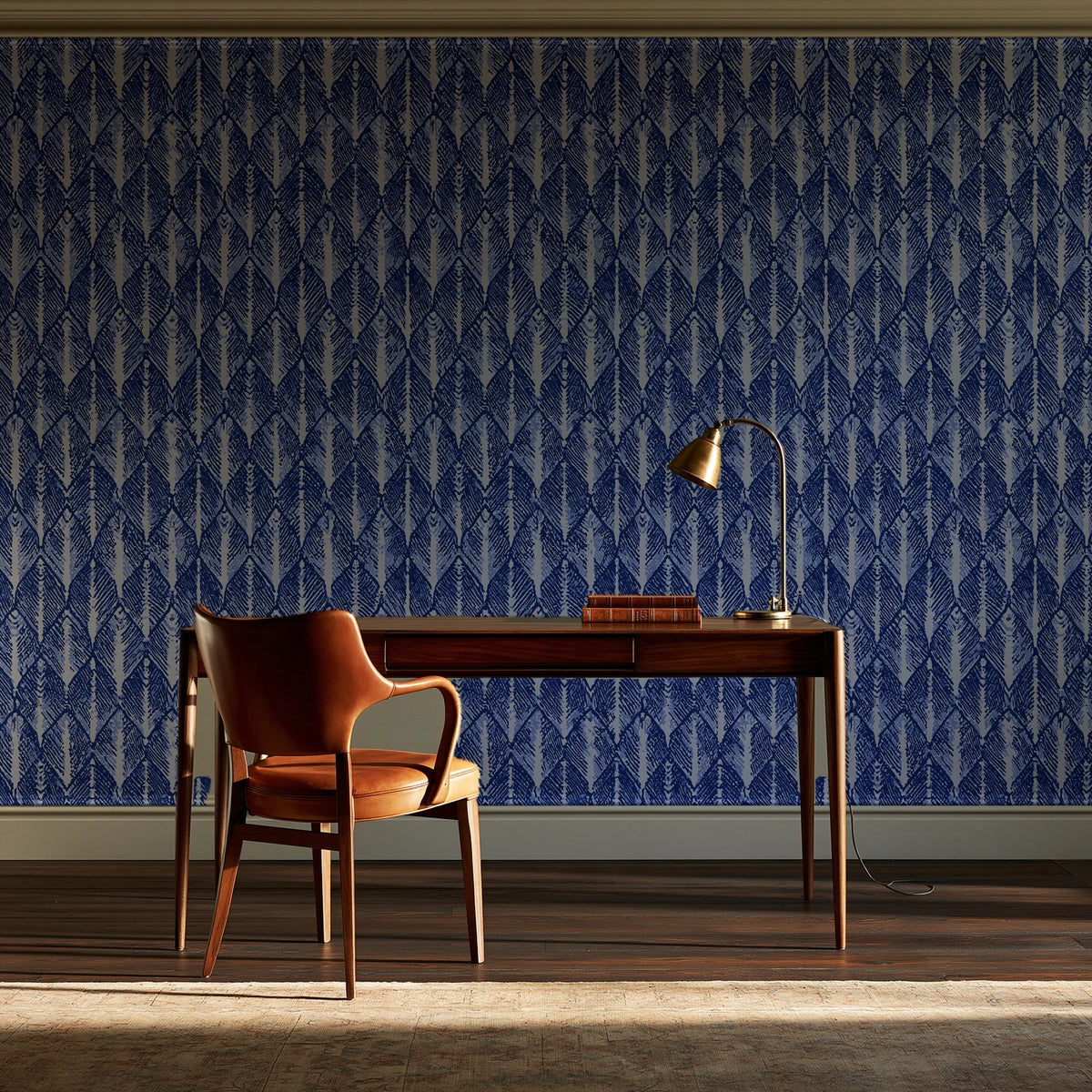 Canyon Ikat Indigo geometric wallpaper as a feature wall in a home study