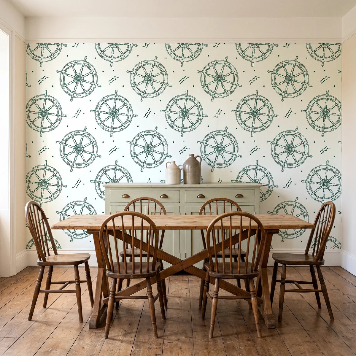 Captain's Wheel Evergreen nautical ship wheel wallpaper in a farmhouse dining room with a sage sideboard and rustic trestle table