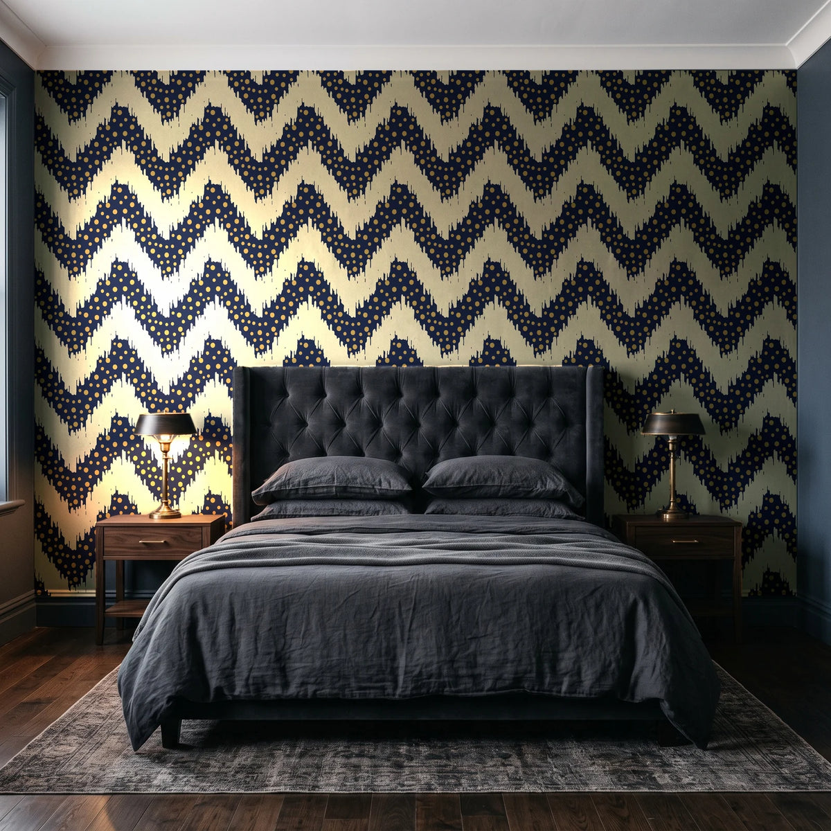 Caramel Drip Midnight chevron wallpaper behind a tufted headboard in a dark, moody bedroom