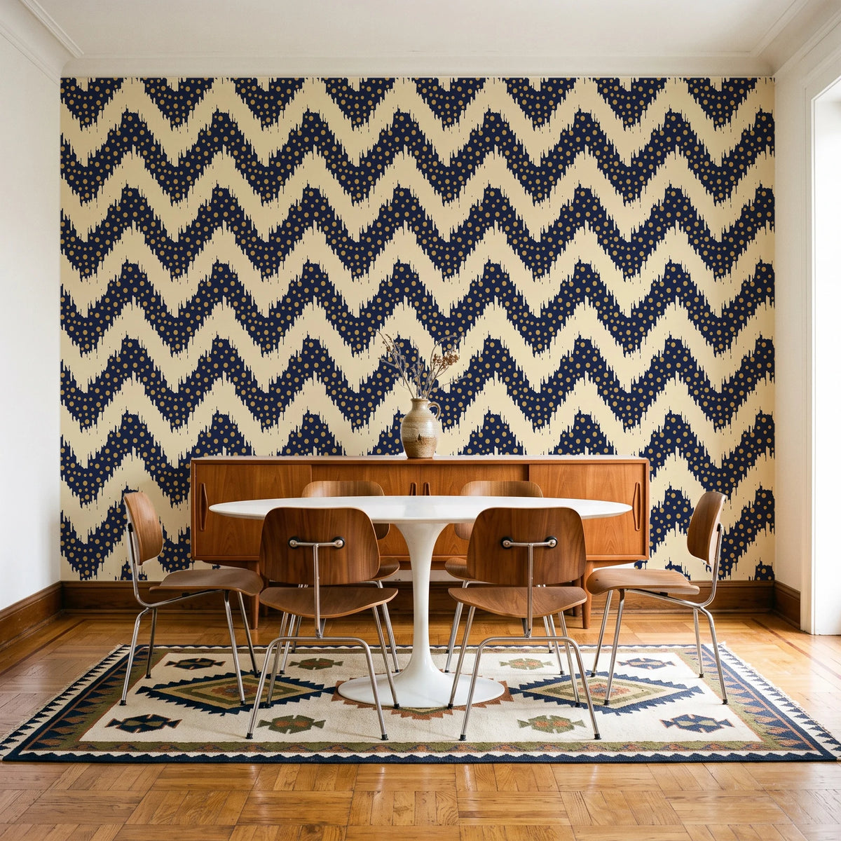 Caramel Drip Midnight chevron wallpaper in a mid-century dining room with a teak sideboard and tulip table