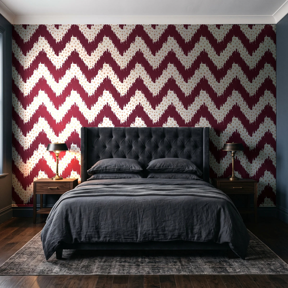 Caramel Drip Oxblood chevron wallpaper behind a tufted headboard in a dark, moody bedroom