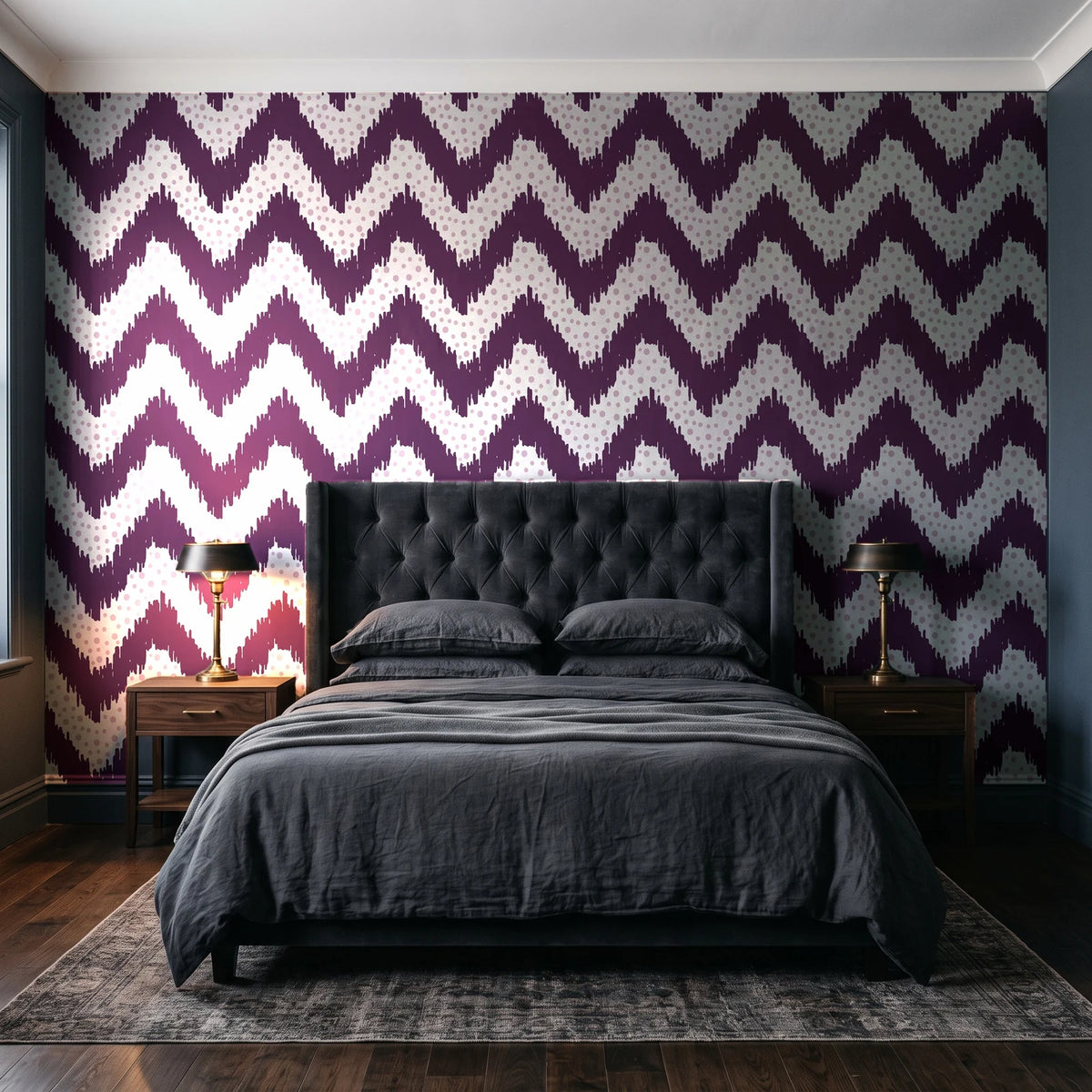 Caramel Drip Plum chevron wallpaper behind a tufted headboard in a dark, moody bedroom