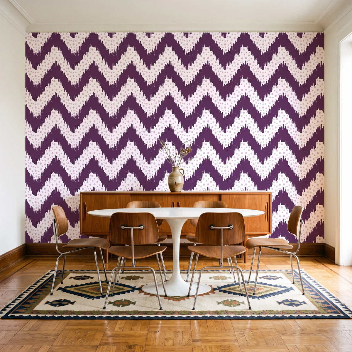 Caramel Drip Plum chevron wallpaper in a mid-century dining room with a teak sideboard and tulip table