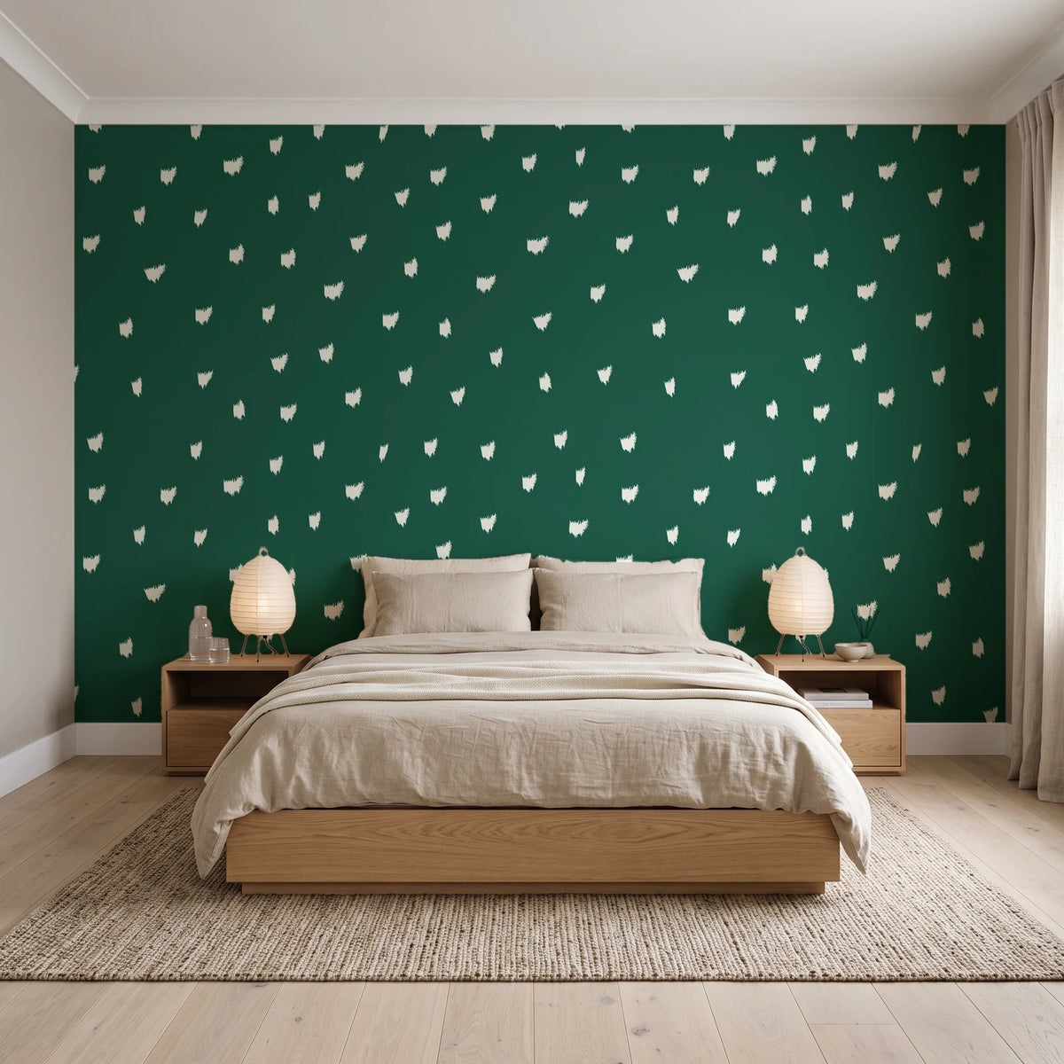 Caramel Haze Emerald brushstroke dot wallpaper behind a low platform bed in a serene Japandi bedroom