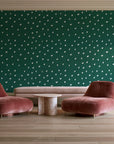 Caramel Haze Emerald brushstroke dot wallpaper in a boutique hotel sitting area