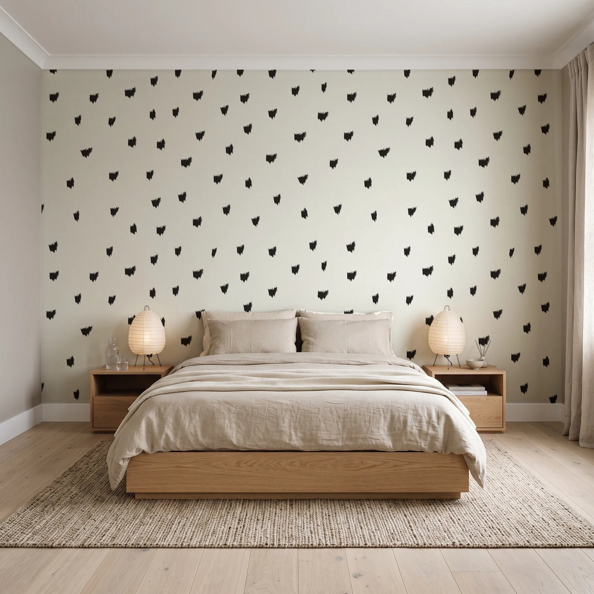 Caramel Haze Ivory brushstroke dot wallpaper behind a low platform bed in a serene Japandi bedroom