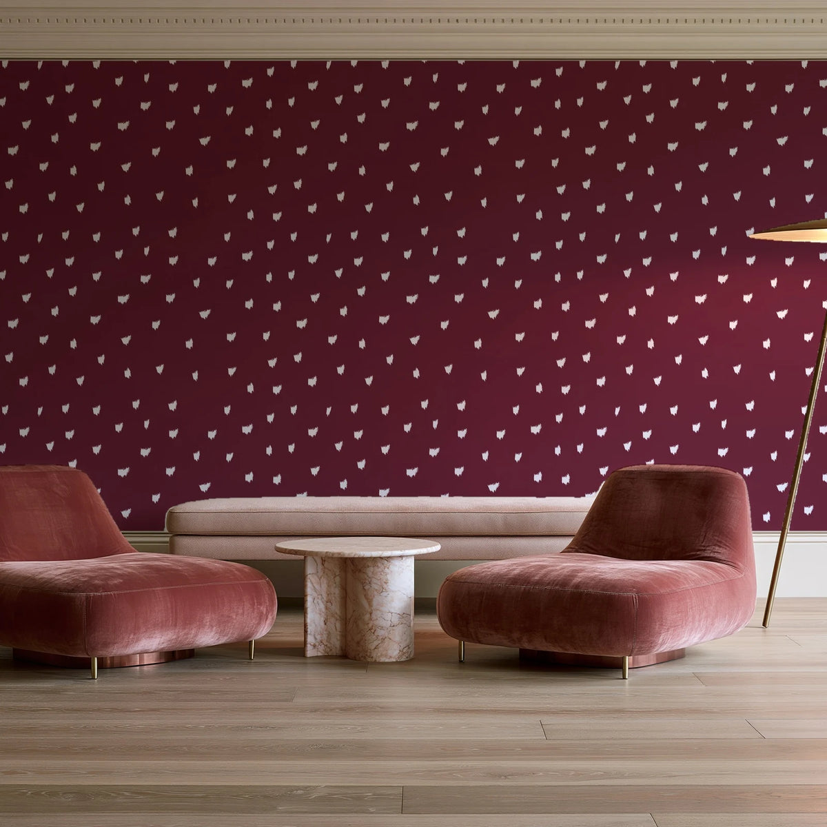 Caramel Haze Oxblood brushstroke dot wallpaper in a boutique hotel sitting area