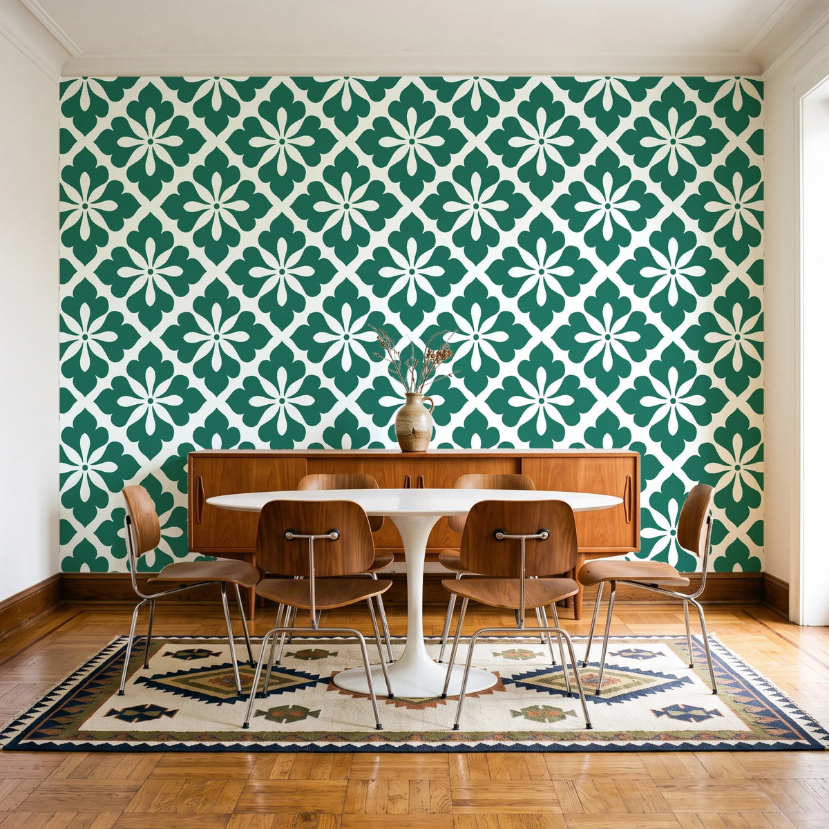 Carbon Bloom Emerald tile floral wallpaper in a mid-century dining room with a teak sideboard and tulip table