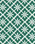 Carbon Bloom Emerald tile floral wallpaper in emerald and linen